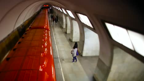 subway station with red train