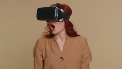 Young-woman-using-virtual-reality-headset-helmet-to-play-simulation-game-app,-watching-video-content