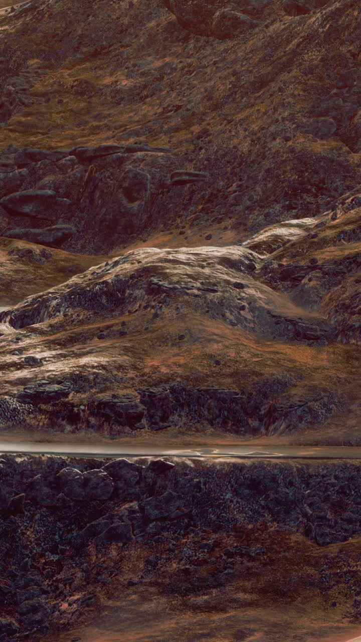 un camino sinuoso a través de un paisaje seco y rocoso