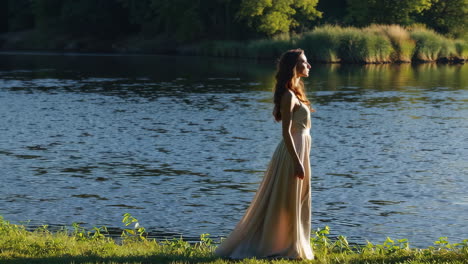 Woman in Beige Dress Walking by River
