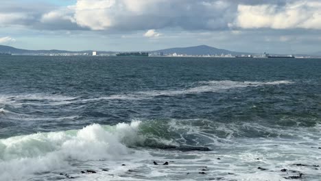 view across table bay from sea point in cape town, south africa