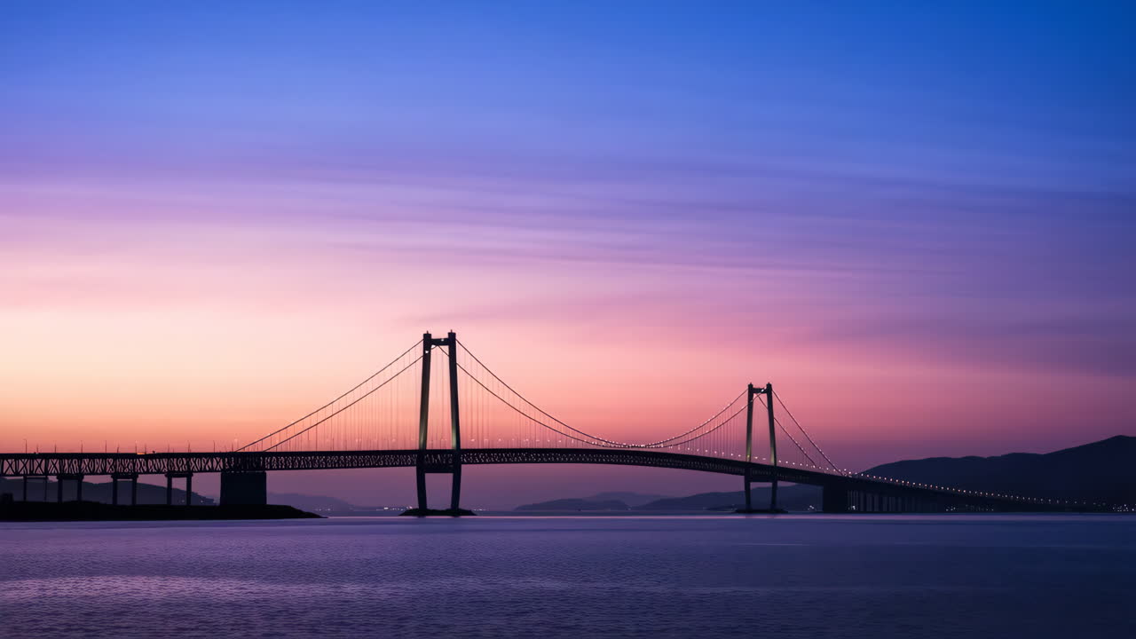 Vibrant Twilight Over a Large Suspension Bridge