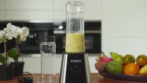 efficient blender creates a smoothie from fresh fruit in an instant