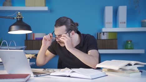 man with visual impairment wears glasses.