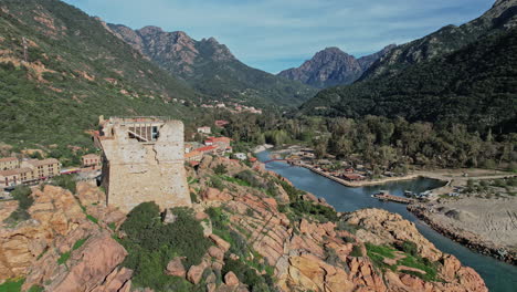 castle overlooking mountain river