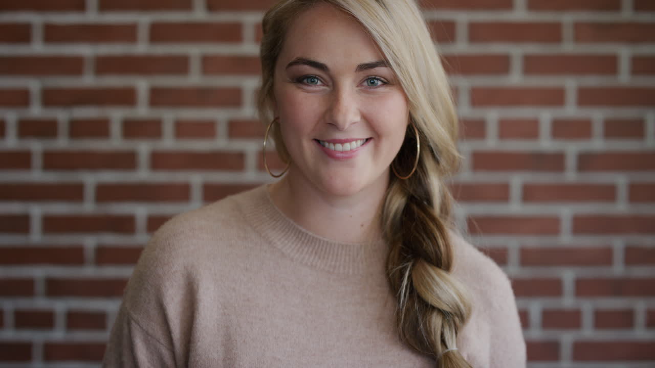 portrait attractive young blonde woman smiling happy successful female student enjoying lifestyle slow motion