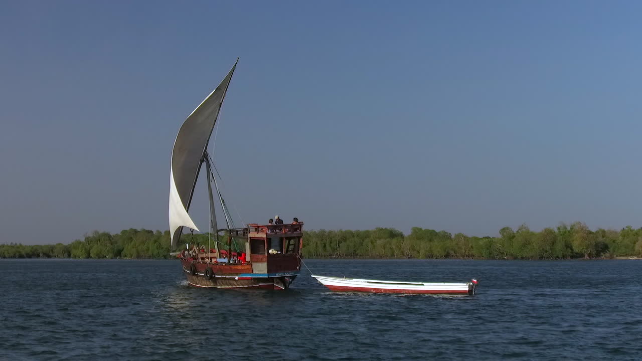A Swahili dhow boat sails on Mida Creek in Watamu, Kenya.
