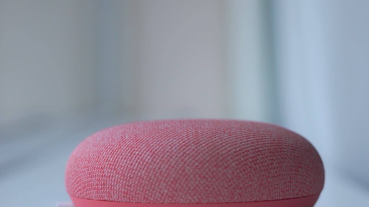 Side Close Up of Male Finger Using Smart Home Digital Device to Increase Volume. Modern Use of Home Technology Using WiFi. Simple Display with Small Lights