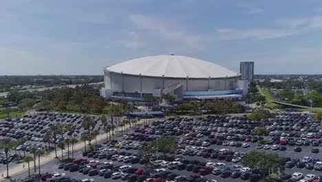 4k aerial drone video of cars in parking lot of tropicana field in downtown st