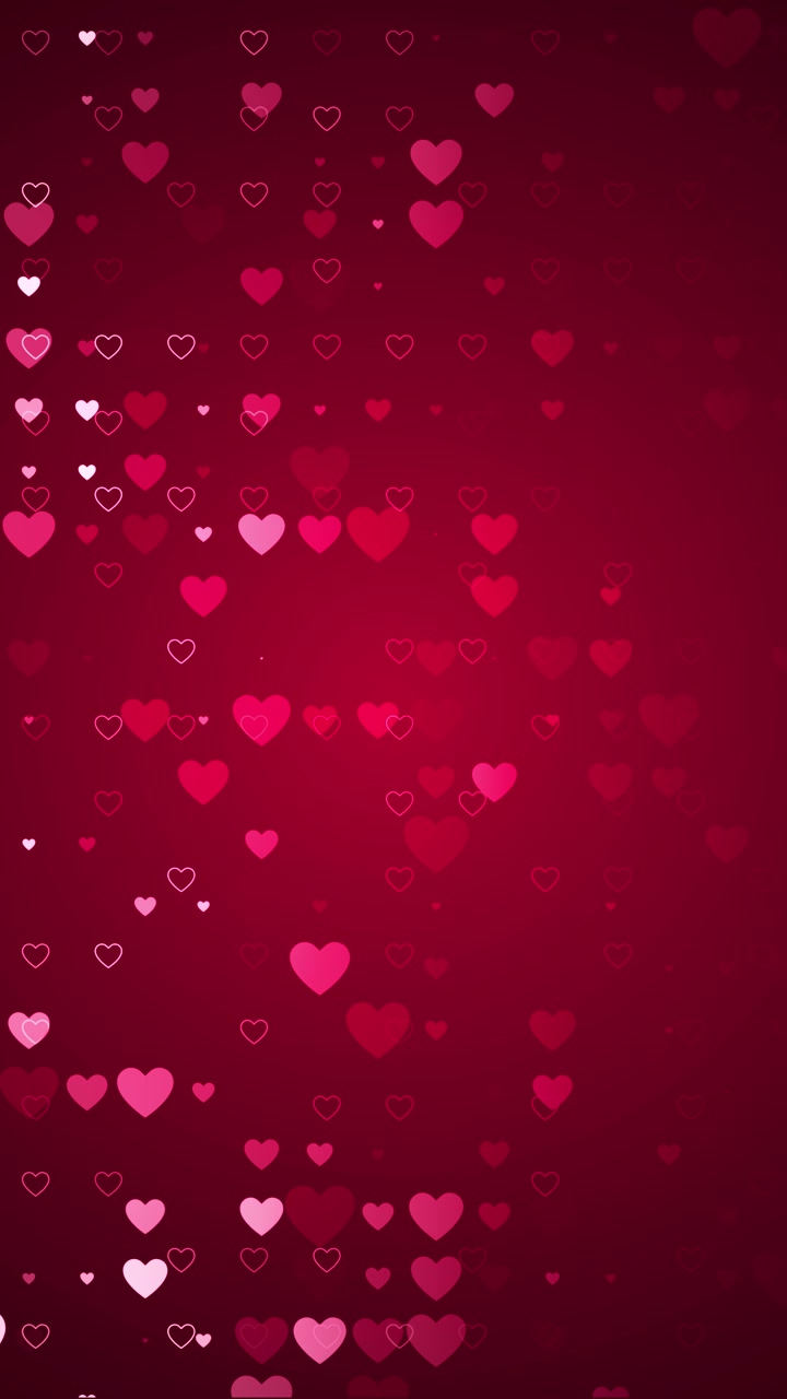 Romantici cuori d'amore rossi con forme fluttuanti delicate, spazio vuoto a destra e un delicato bagliore festivo perfetto