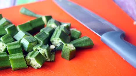 chopped okra on a cutting board