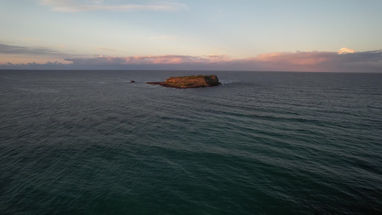 Drone Shot Of Cook Island At Sunset In NSW, Australia - Aerial Pullback
