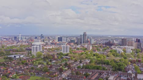 birmingham city aerial view of skyline and skyscrapers on overcast cloudy day, england