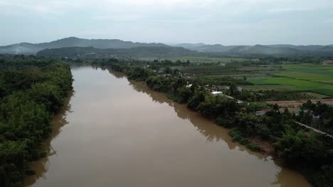 aerial shot moving forward along dong nai river, cat tien national park, vietnam