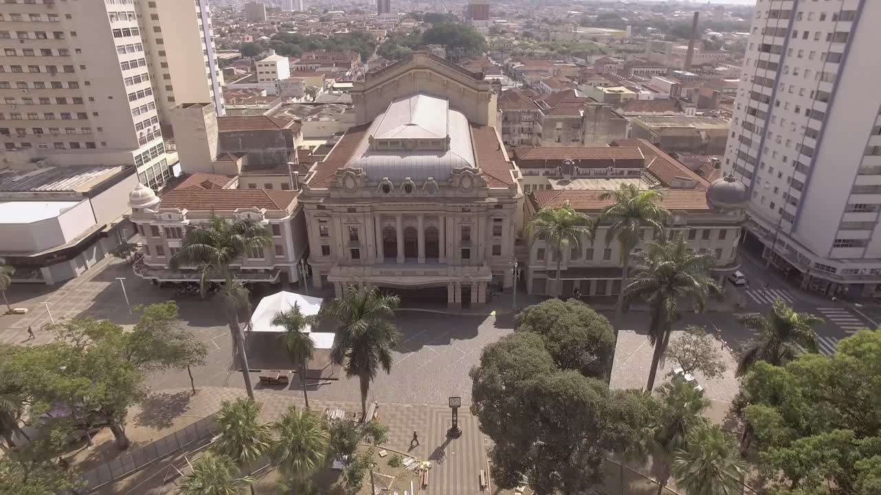 Aerial view of a city theater and surrounding buildings