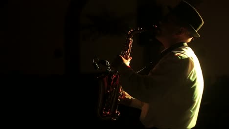 musician playing alto saxophone on a gig, playing the saxophone, jazz, music