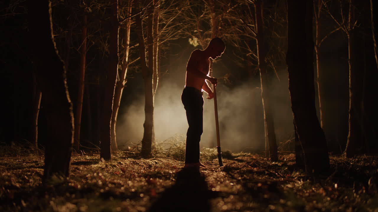 Man Working in the Dark Forest