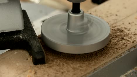 circular hole saw drill bit in action, close-up