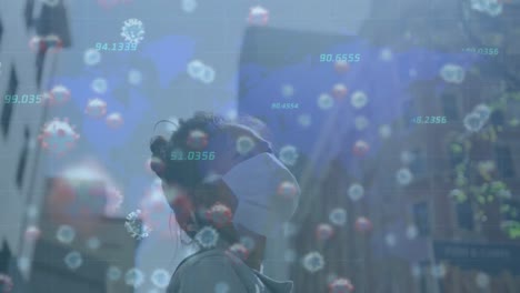 코로나 19 세포의 애니메이션과 얼굴 마스크를 입은 두 인종 여성에 대한 숫자 처리
