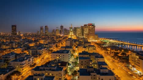 vibrant night cityscape with illuminated buildings and coastline