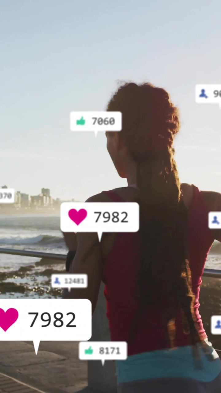 Social media engagement animation over woman jogging along seaside promenade
