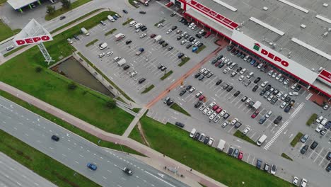 aerial view of depo store and parking lot