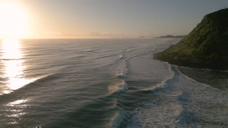 Aerial-views-over-Burleigh-Heads-at-sunrise,-Gold-Coast,-Queensland,-Australia