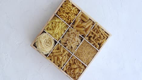 container with macaroni of different shape