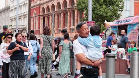 people gather outside museum in london