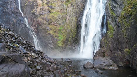 Water-falling-down-over-the-Voringsfossen-waterfall-in-Hardangervidda-in-Norway