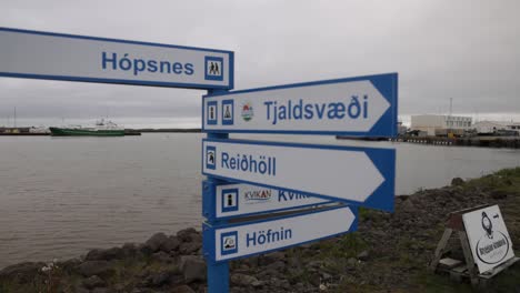 road sign in grindavik, iceland with gimbal video moving down in slow motion