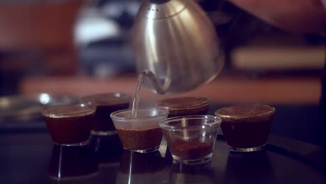 Pouring-steaming-hot-water-into-instant-coffee-crystals