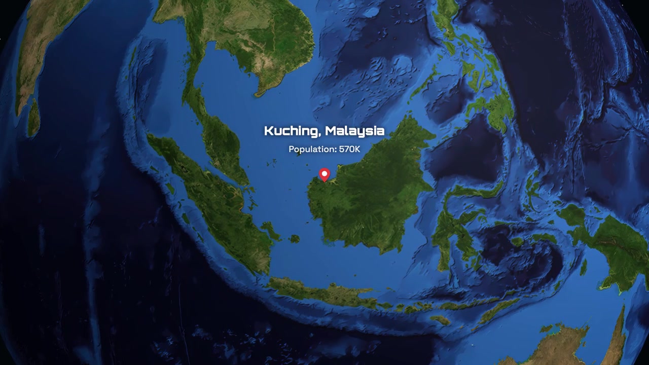 Digital animation zooms from outer space into Kuching Malaysia with population statistics text overlay