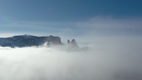 winter alpe di siusi above the clouds, dolomites