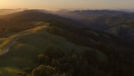 stunning mountain landscape with golden hour sun rays