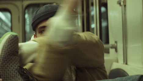 Young-Man-Dancing-to-Camera-in-Subway-Train