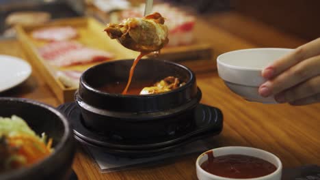 dakgaejang- small serving of korean spicy chicken stew in korean restaurant