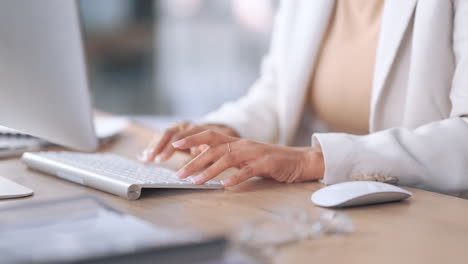 closeup of a receptionist typing