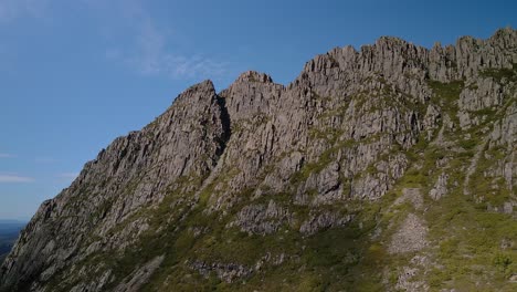 profile view of rough cliffs of hills on sunny day