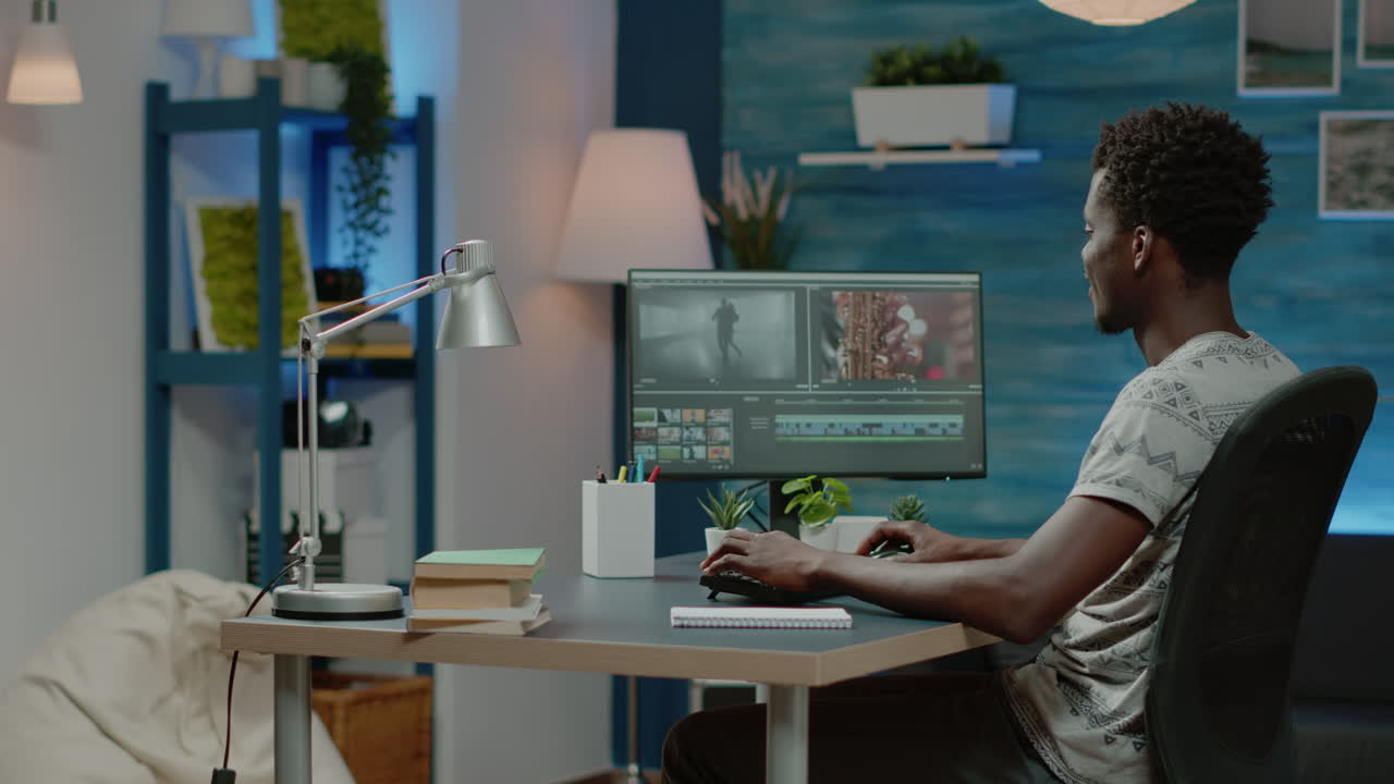 Man working as videographer editing video with musical footage