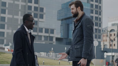 two men in conversation