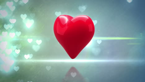 corazón rojo girando en un fondo brillante