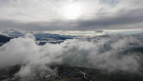 Aerial-shot-in-Switzerland-over-the-town-of-Crans-Montana,-Valais