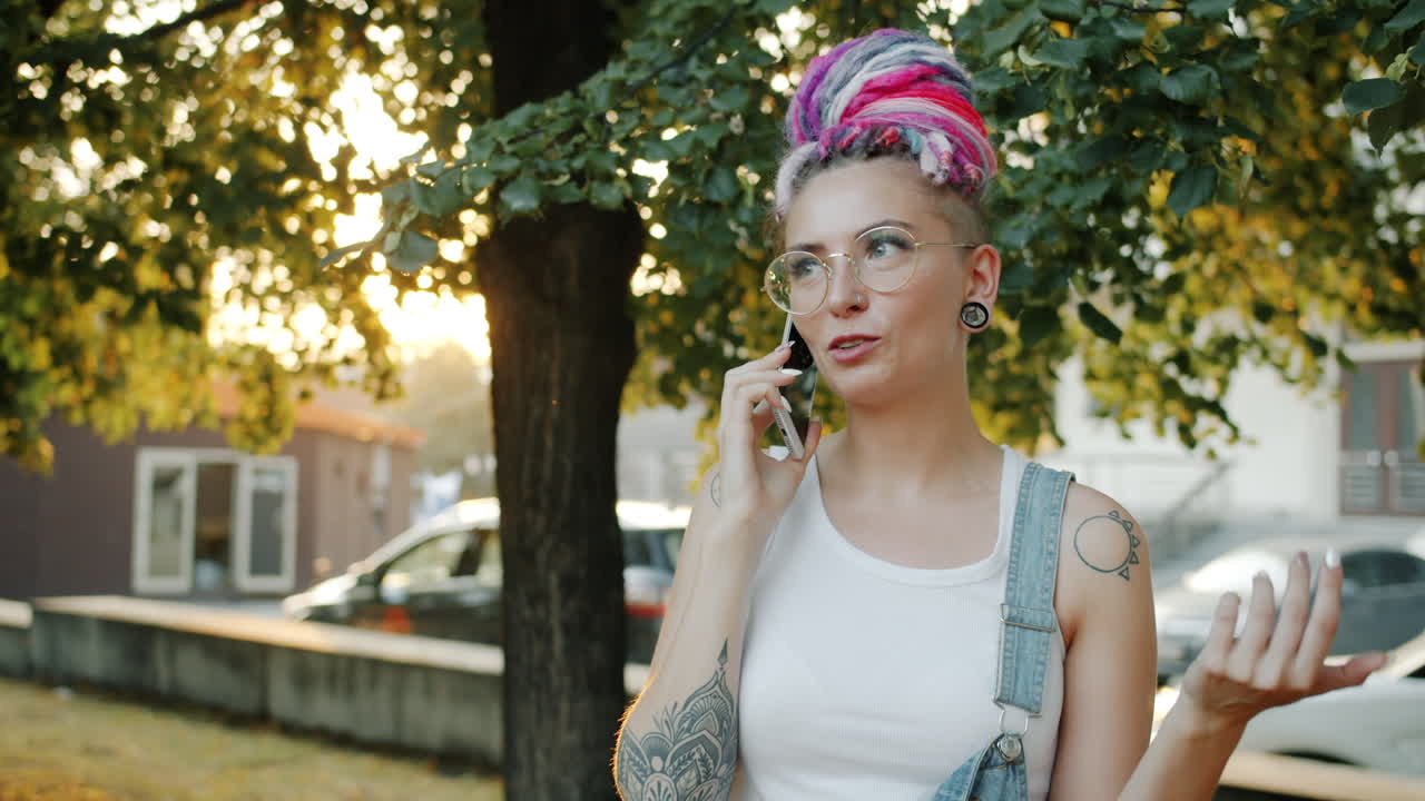 Stylish Woman Talking on Phone Outdoors