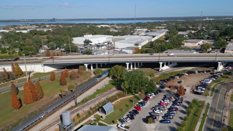 amtrak train leaving a station in lakeland florida on a sunny day