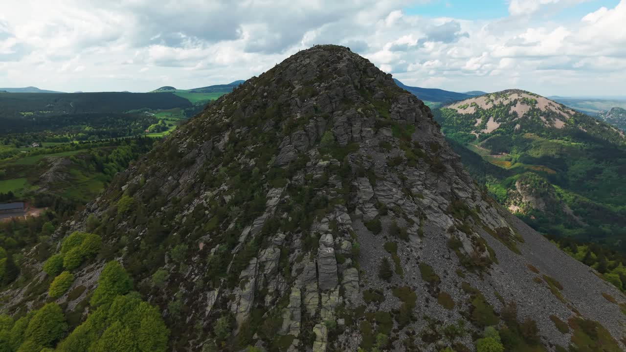 Aerial shot around the Mont Gerbier de Jonc, source of the Loire river, in Ardeche departement on an overcast day, Auvergne Rhone Alpes Region, France