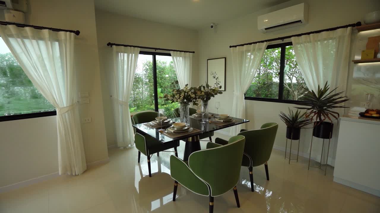 moderno y elegante diseño interior de casa de plan abierto gris y verde