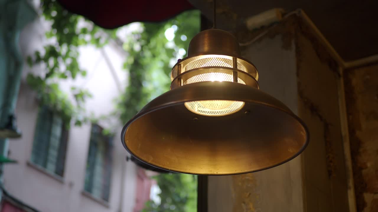 A light fixture hangs in a room