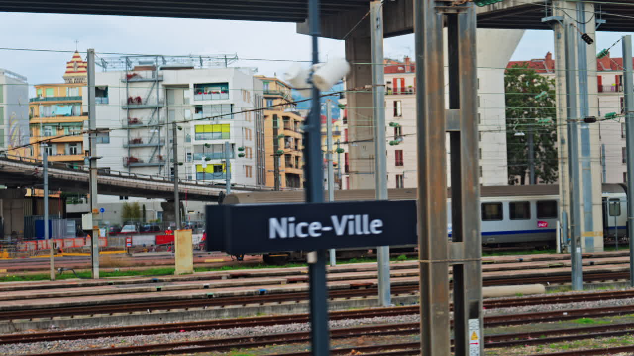Nice, France - February 4, 2025: View from a moving train of the Nice Ville Central train station