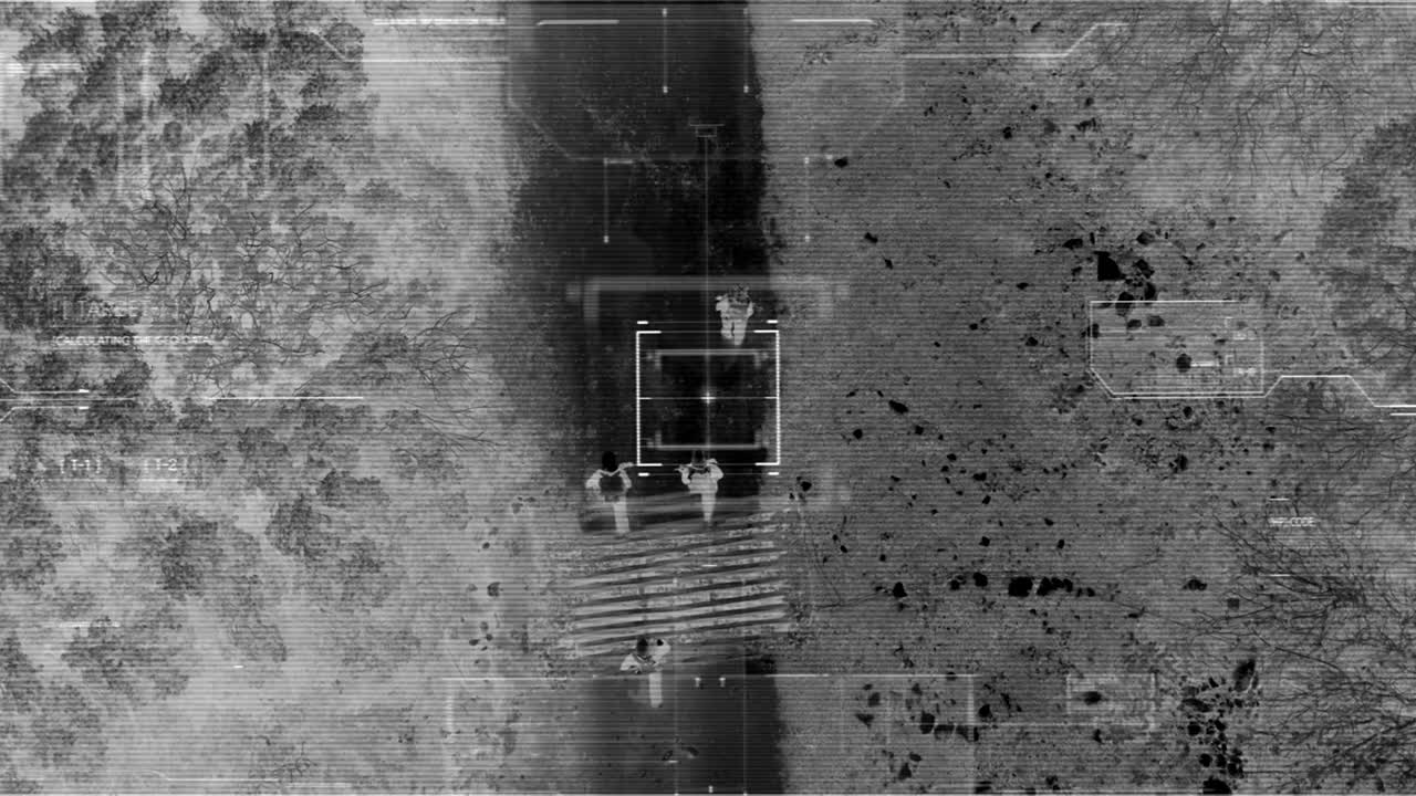 Drone with thermal night vision view of terrorist squad walking with weapons